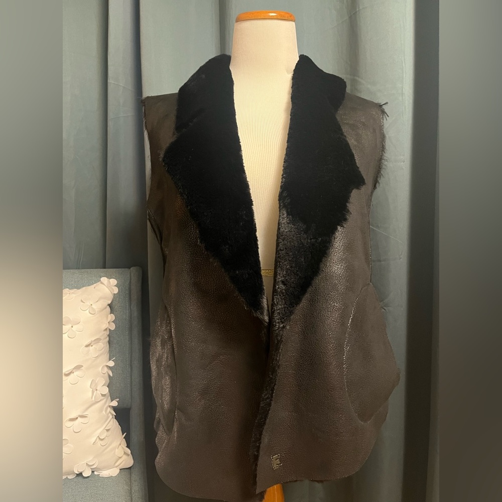 Faux shearling vest.